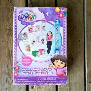 Brand new in the box, Nickelodeon Dora the Explorer 10 piece room decor in a box